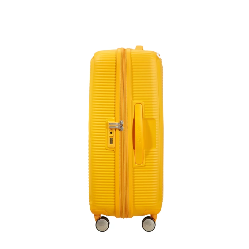 American Tourister Soundbox 4-kerekes keményfedeles bővíthető bőrönd 67 x 46.5 x 29/32 cm, sárga
