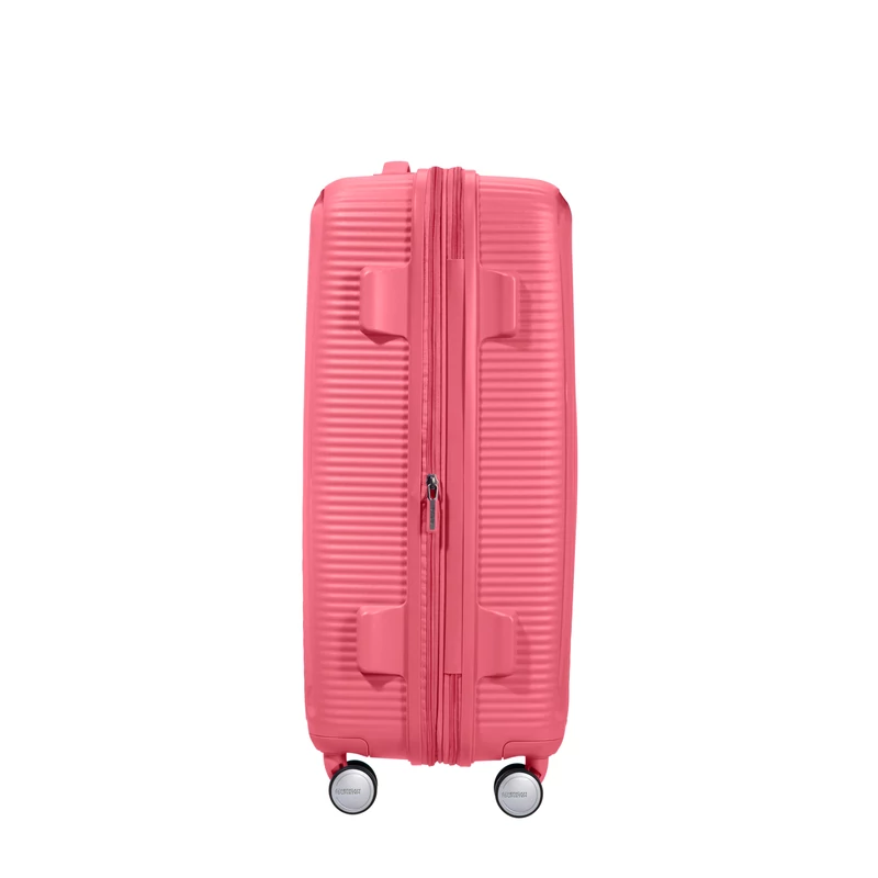American Tourister Soundbox 4-kerekes keményfedeles bővíthető bőrönd 67 x 46.5 x 29/32 cm, rózsaszín