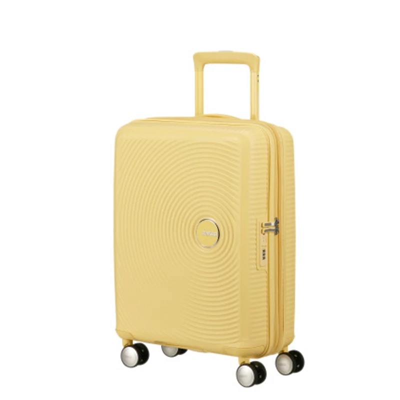 American Tourister Soundbox 4-kerekes keményfedeles bővíthető kabin bőrönd 55x40x20/23 cm, pasztell sárga