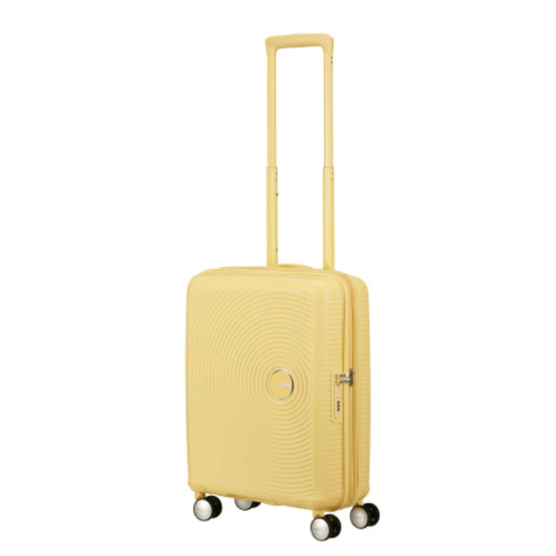 American Tourister Soundbox 4-kerekes keményfedeles bővíthető kabin bőrönd 55x40x20/23 cm, pasztell sárga