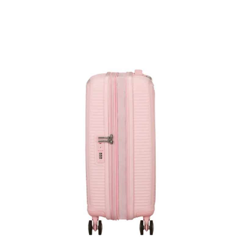 American Tourister Soundbox 4-kerekes keményfedeles bővíthető kabin bőrönd 55x40x20/23 cm, pasztell rózsaszín