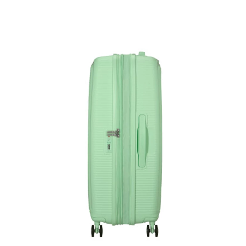 American Tourister Soundbox 4-kerekes keményfedeles bővíthető bőrönd 77 x 51.5 x 29.5/32.5 cm, pasztell zöld