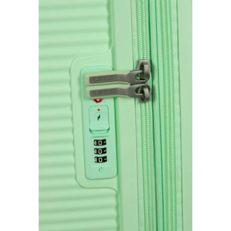 American Tourister Soundbox 4-kerekes keményfedeles bővíthető bőrönd 77 x 51.5 x 29.5/32.5 cm, pasztell zöld