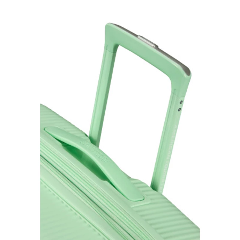 American Tourister Soundbox 4-kerekes keményfedeles bővíthető bőrönd 77 x 51.5 x 29.5/32.5 cm, pasztell zöld