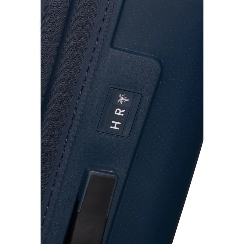 American Tourister Dashpop 4-kerekes keményfedeles bővíthető bőrönd 67 x 45 x 28/32 cm, sötétkék
