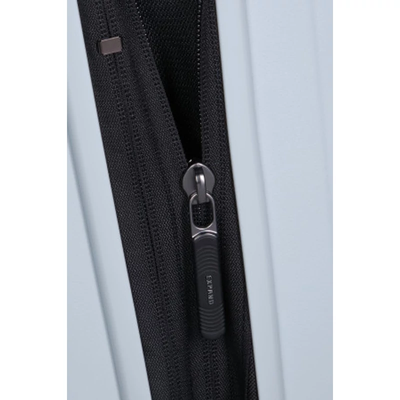 Samsonite Restackd spinner 4-kerekes keményfedeles bővíthető kabin bőrönd 55 x 40 x 20/23 cm, halványkék
