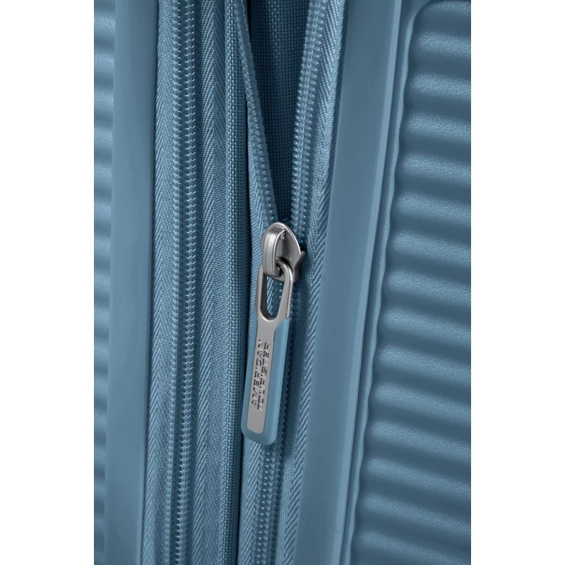 American Tourister Soundbox 4-kerekes keményfedeles bővíthető bőrönd 67 x 46.5 x 29/32 cm, szürkés kék