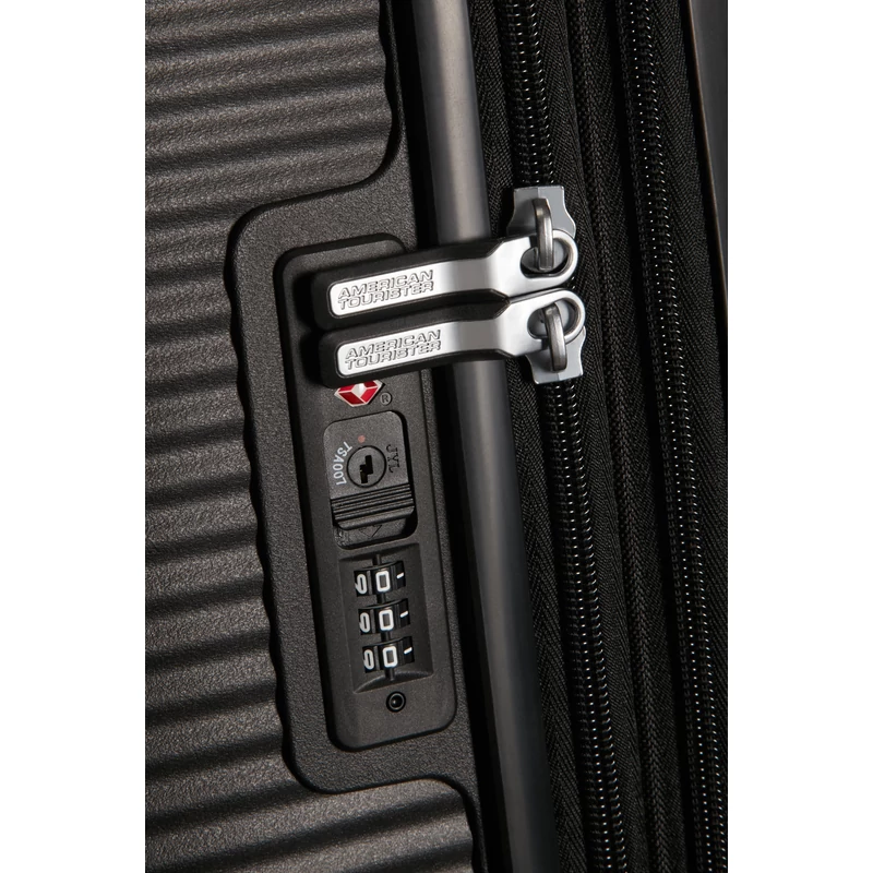 American Tourister Soundbox 4-kerekes keményfedeles bővíthető kabin bőrönd 55x40x20/23 cm, fekete