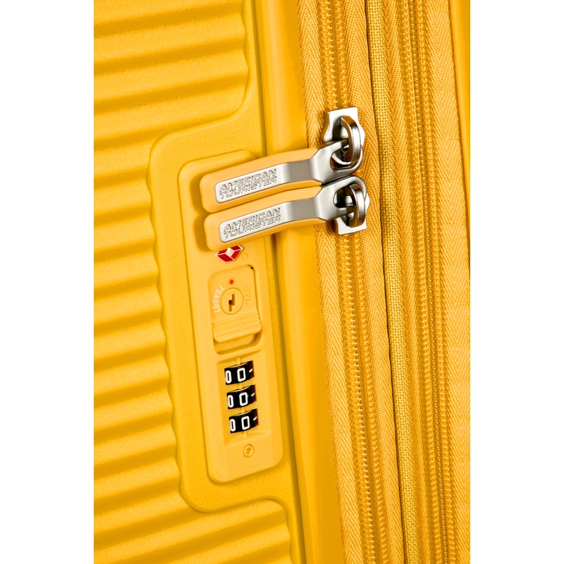 American Tourister Soundbox 4-kerekes keményfedeles bővíthető kabin bőrönd 55x40x20/23 cm, sárga