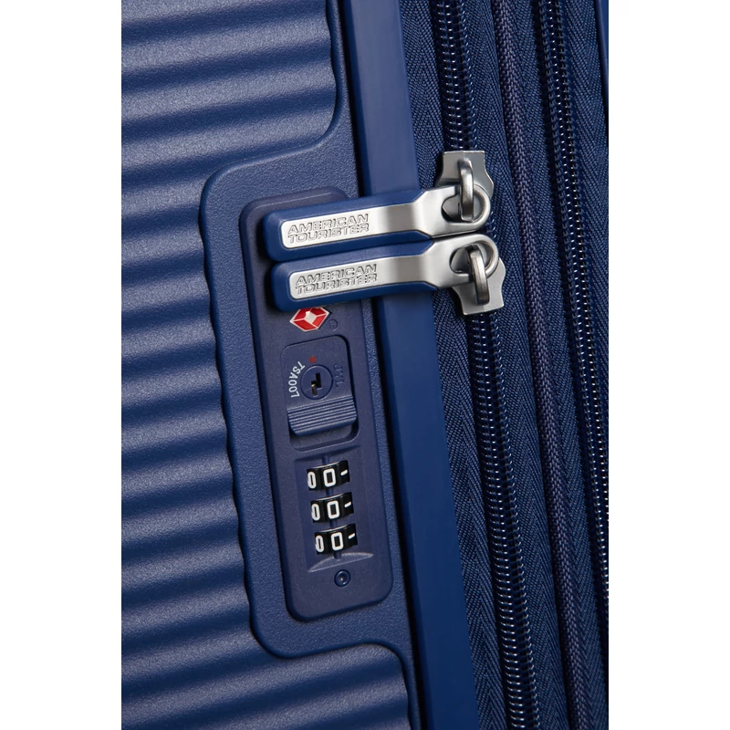 American Tourister Soundbox 4-kerekes keményfedeles bővíthető bőrönd 67 x 46.5 x 29/32 cm, sötétkék