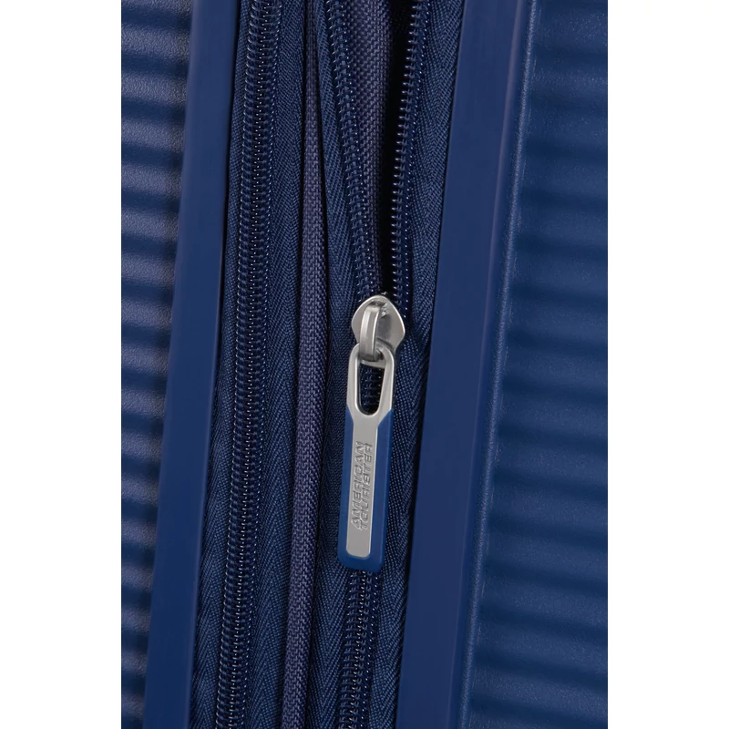 American Tourister Soundbox 4-kerekes keményfedeles bővíthető bőrönd 67 x 46.5 x 29/32 cm, sötétkék